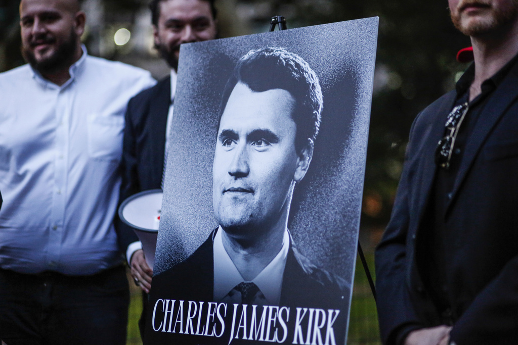 The New York Young Republicans Club holds a vigil for Turning Point USA CEO and co-founder Charlie Kirk at Madison Square Park on Friday, Sept. 12, 2025, in New York. (AP Photo/Kena Betancur)