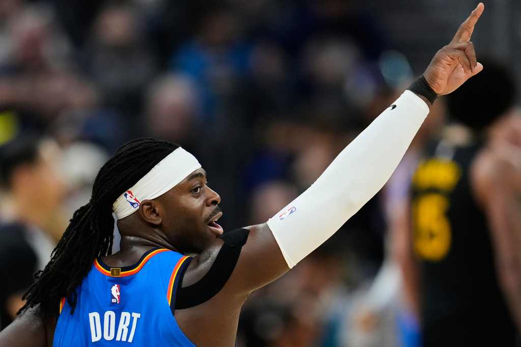 Oklahoma City Thunder guard Luguentz Dort (5) celebrates after making a 3-point basket during the first half of an NBA basketball game against the Golden State Warriors, Friday, Jan. 2, 2026, in San Francisco. (AP Photo/Godofredo A. Vásquez)
