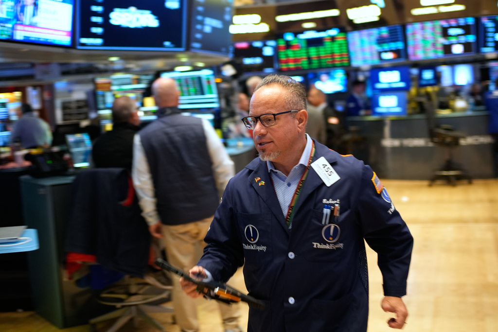 Robert Arciero works on the floor at the New York Stock Exchange in New York, Wednesday, Oct. 29, 2025. (AP Photo/Seth Wenig)