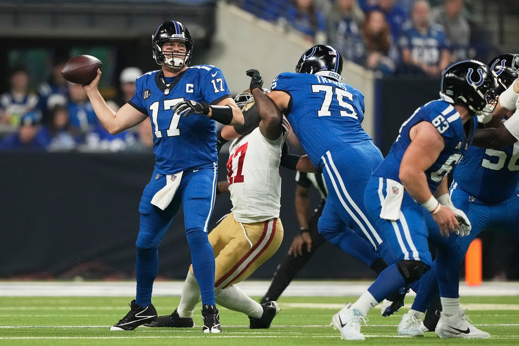 Indianapolis Colts quarterback Philip Rivers (17) passes against the San Francisco 49ers during the first half of an NFL football game, Monday, Dec. 22, 2025, in Indianapolis. (AP Photo/Carolyn Kaster)