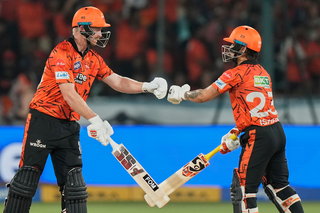 Sunrisers Hyderabad's Heinrich Klaasen, left and captain Ishan Kishan interacts after Klaasen hits a six during the Indian Premier League cricket match between Sunrisers Hyderabad and Royal Challengers Bengaluru in Hyderabad, India, Friday, May 22, 2026. (AP Photo/Mahesh Kumar A.)