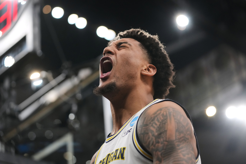 Michigan's Yaxel Lendeborg (23) celebrates during the second half in the Elite Eight of the NCAA college basketball tournament against Tennessee, Sunday, March 29, 2026, in Chicago. (AP Photo/Erin Hooley)