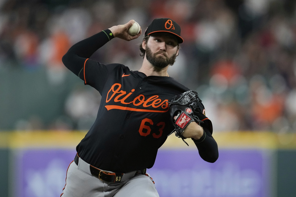 Baltimore Orioles starting pitcher Brandon Young throws during the first inning of a baseball game against the Houston Astros in Houston, Friday, Aug. 15, 2025. (AP Photo/Ashley Landis)
