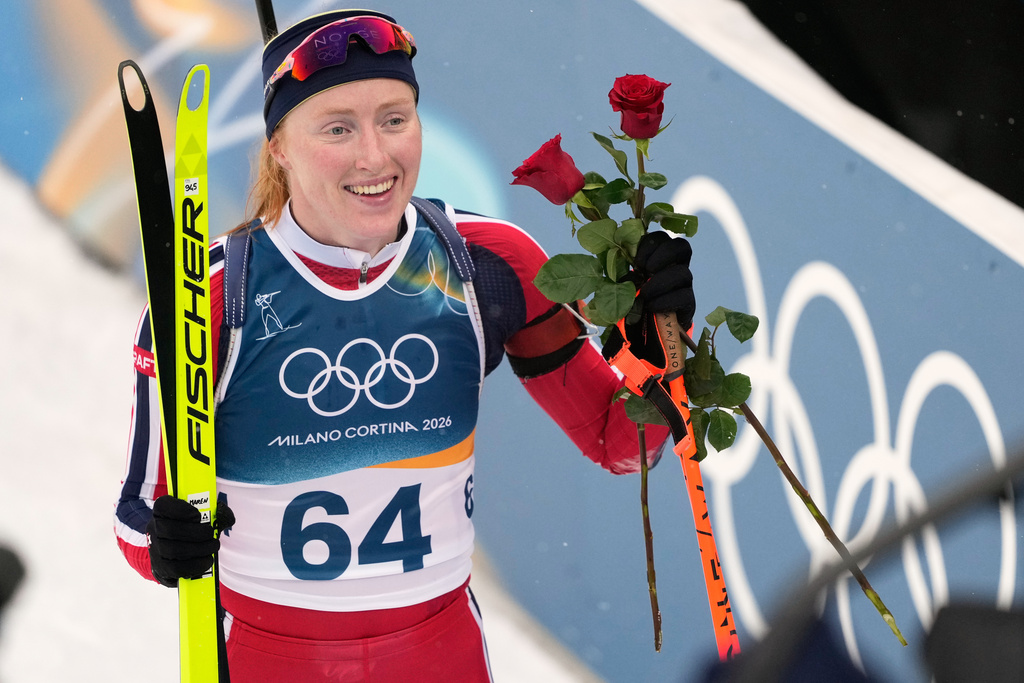 Maren Kirkeeide of Norway takes gold in the biathlon sprint during her Olympic debut