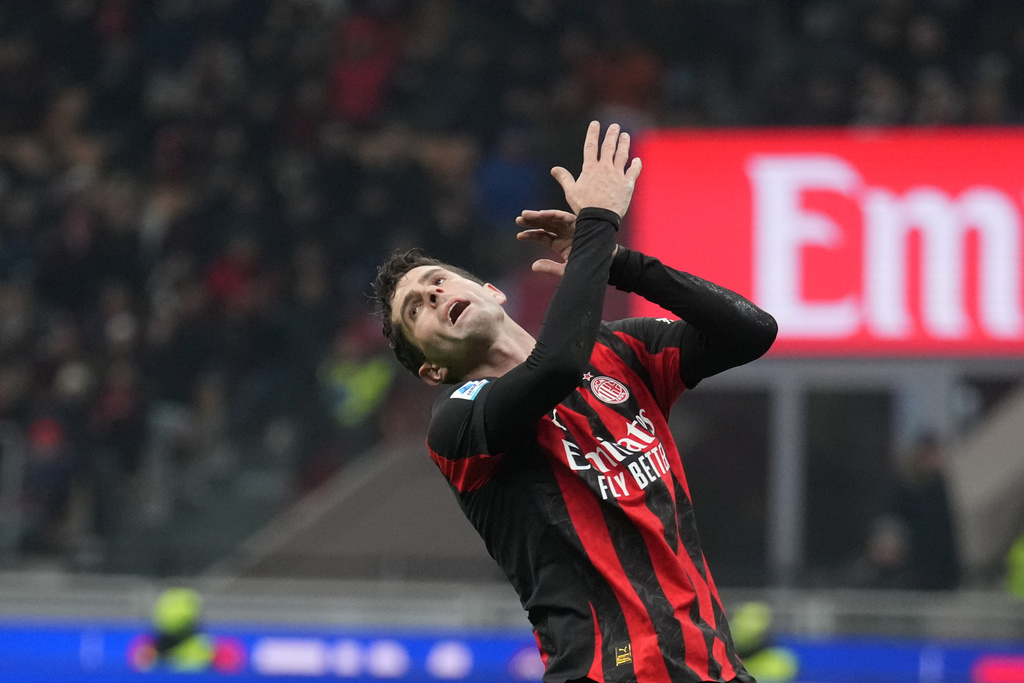 AC Milan's Christian Pulisic reacts after missing a chance to score during the Serie A soccer match between AC Milan and Genoa, in Milan, Italy, Thursday, Jan. 8, 2026. (AP Photo/Antonio Calanni)