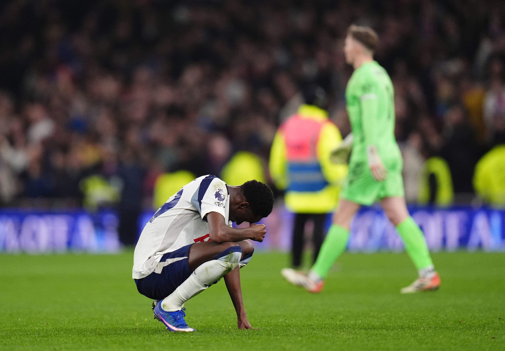 Tottenham Hotspur's Pape Matar Sarr reacts after the English Premier League soccer match between Tottenham Hotspur and Crystal Palace in London, Thursday, March 5, 2026. (John Walton/PA via AP)
