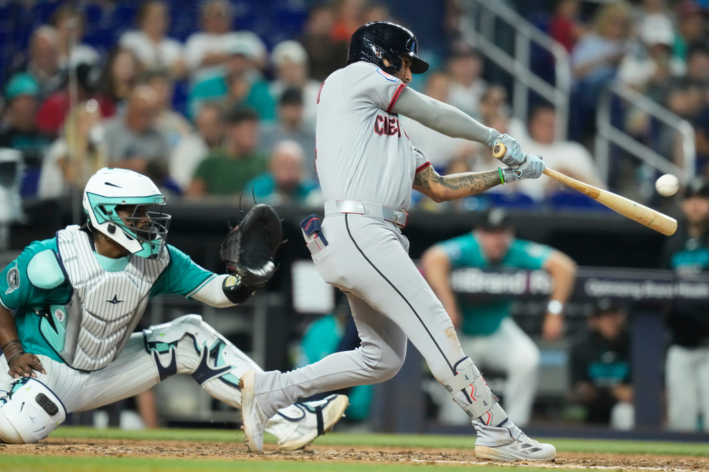 Cleveland Guardians' Brayan Rocchio hits a solo home run during the fifth inning of a baseball game against the Miami Marlins, Sunday, July 12, 2026, in Miami. (AP Photo/Lynne Sladky)