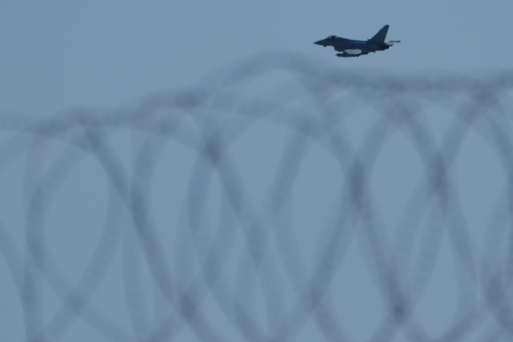 A Fighter Jet prepares for landing at the U.K.'s RAF Akrotiri air base after it was hit by a drone strike early morning near Limassol, Cyprus, Monday, March, 2, 2026. (AP Photo/Petros Karadjias)