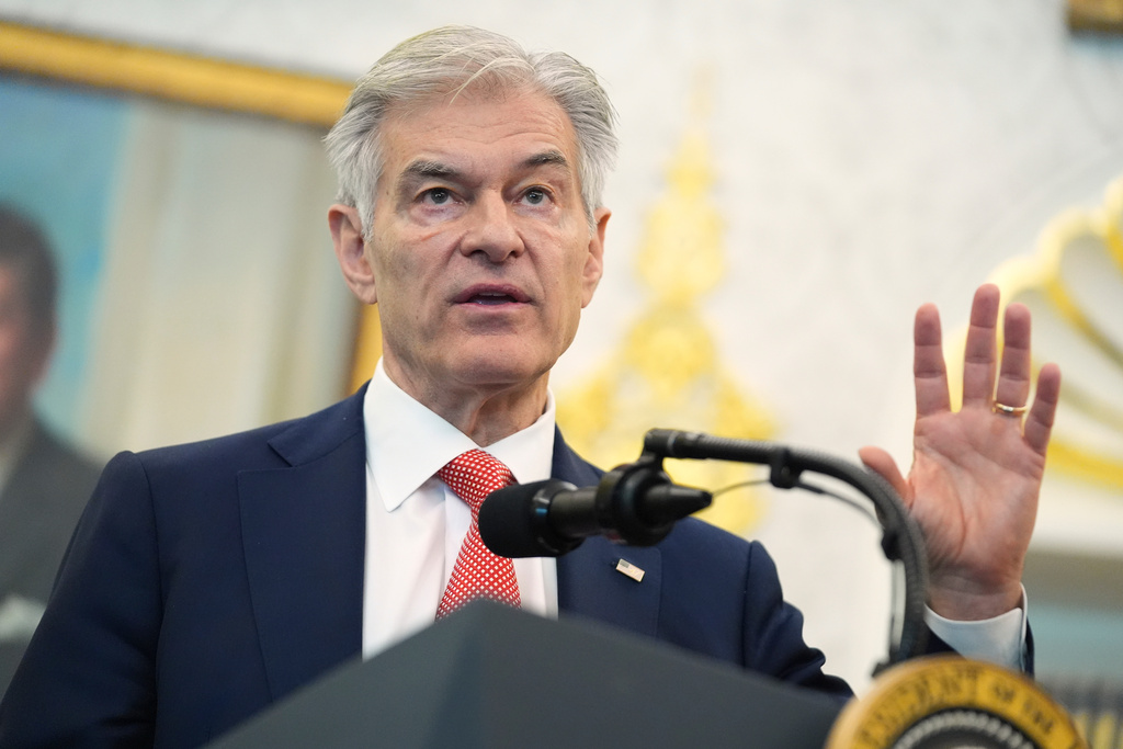 FILE - Mehmet Oz, administrator of the Centers for Medicare & Medicaid Services, speaks during an event about drug prices with President Donald Trump, Thursday, Nov. 6, 2025, in the Oval Office of the White House in Washington. (AP Photo/Evan Vucci, File)