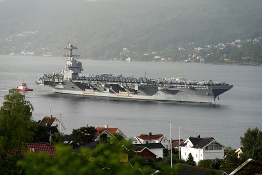FILE - The American aircraft carrier USS Gerald R. Ford, on its way into the Oslofjord, at Drobak in Norway, Sept. 12, 2025. (Lise Aaserud/NTB Scanpix via AP, File) FILE - The American aircraft carrier USS Gerald R. Ford, on its way into the Oslofjord, at Drobak in Norway, Sept. 12, 2025. (Lise Aaserud/NTB Scanpix via AP, File)