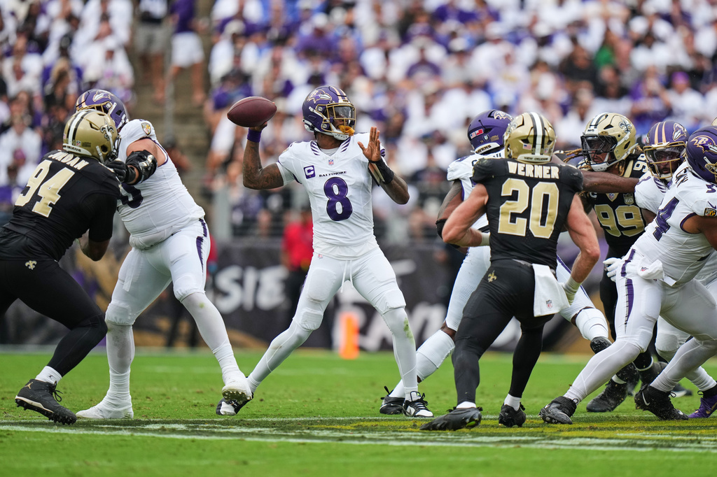 Baltimore Ravens quarterback Lamar Jackson (8) passes against the New Orleans Saints in the second half of an NFL football game in Baltimore, Sunday, Sept. 20, 2026. (AP Photo/Stephanie Scarbrough)