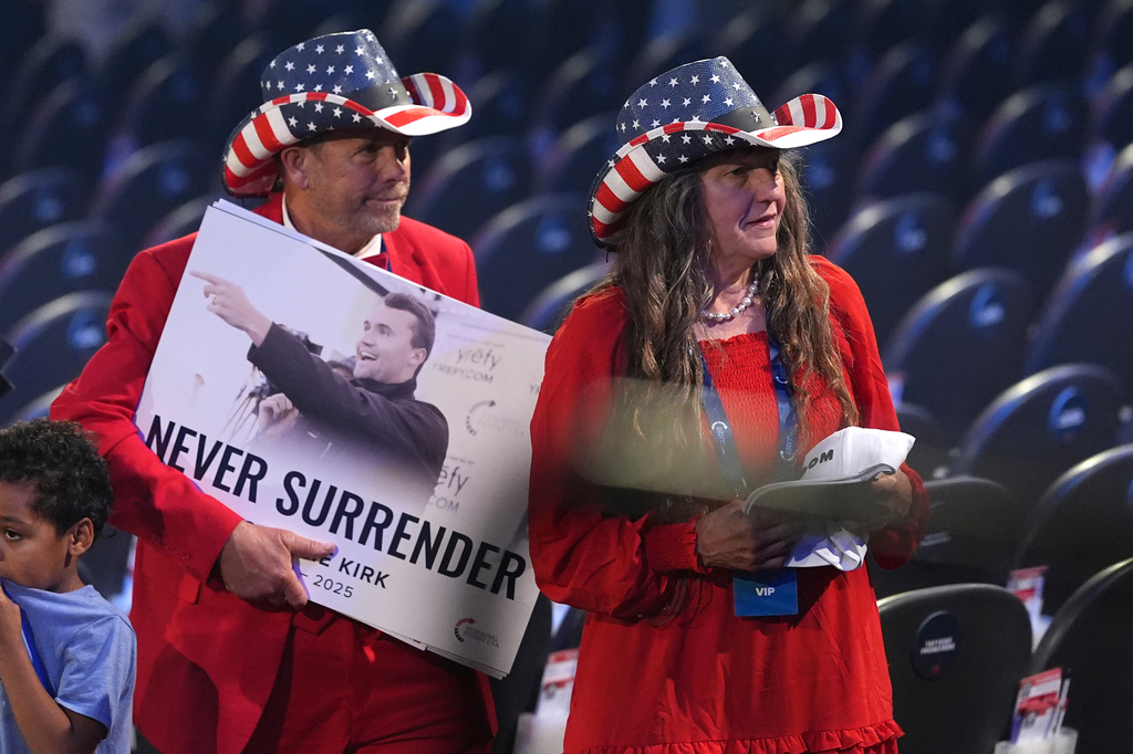 People prepare to depart after President Donald Trump spoke at a Turning Point USA event at Dream City Church, Friday, April 17, 2026, in Phoenix. (AP Photo/Ross D. Franklin)