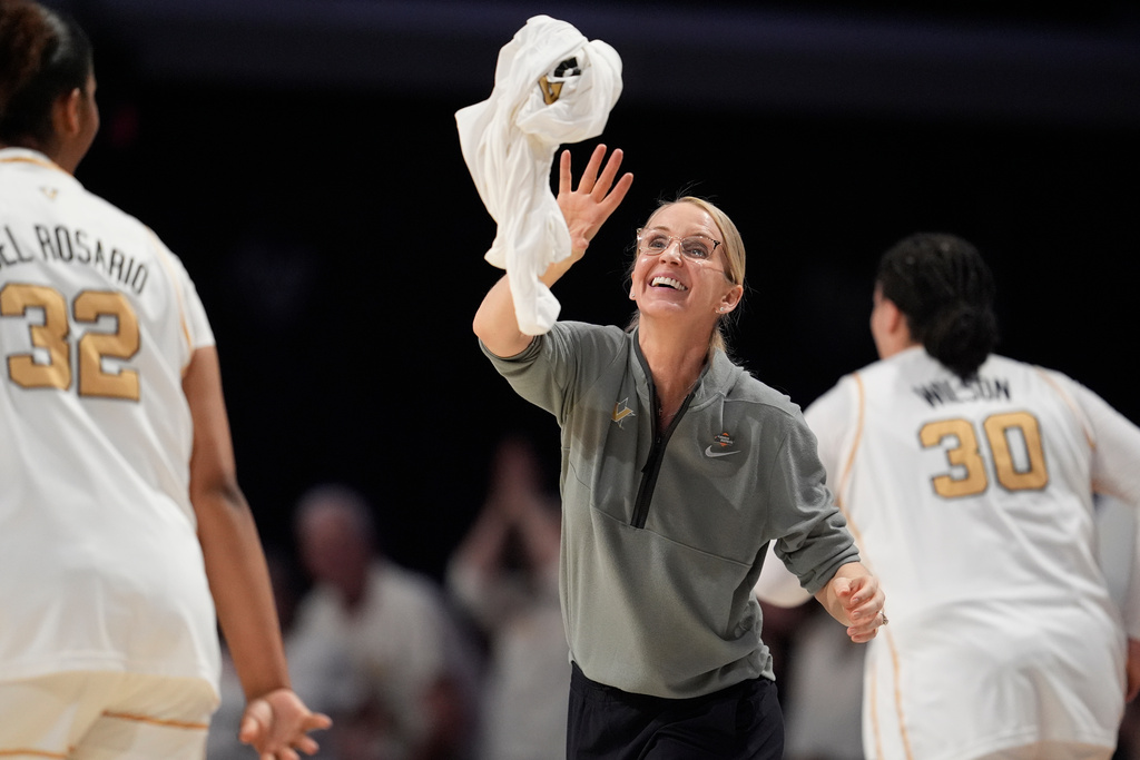 Vanderbilt head coach Shea Ralph celebrates during the second half in the first round of the NCAA college basketball tournament against High Point, Saturday, March 21, 2026, in Nashville, Tenn. (AP Photo/George Walker IV)