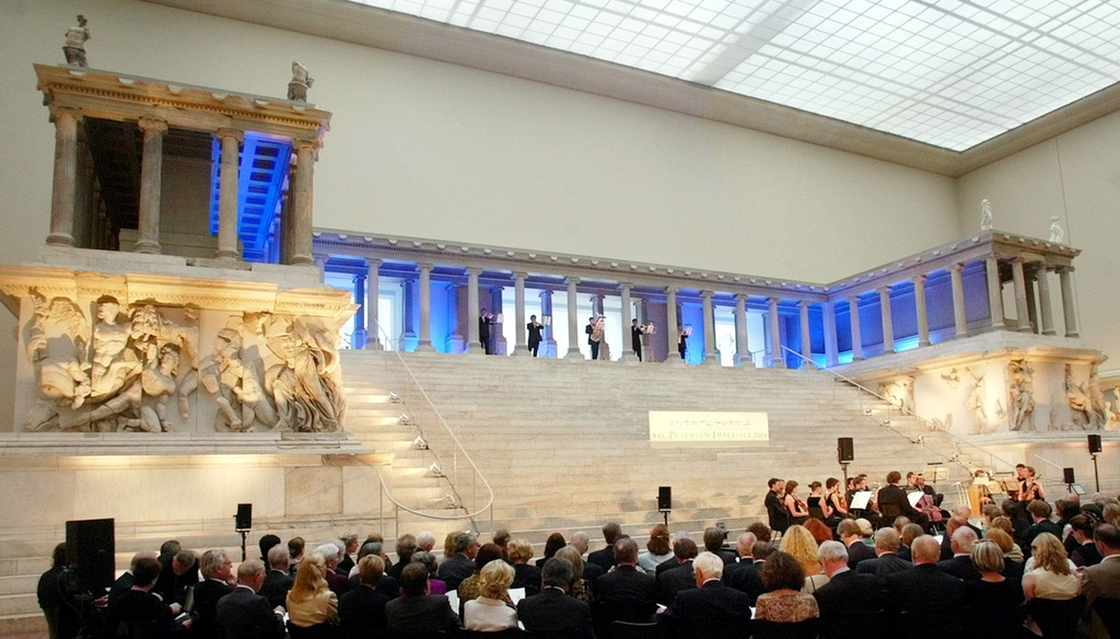 FILE - In this June, 8, 2004 file photo the world famous Pergamon Altar is pictured during the "Praemium Imperiale" celebration hosted by the Japanese organization "Nobel Prize for the Arts", in the Berlin Pergamon museum. (AP Photo/Fritz Reiss, File)