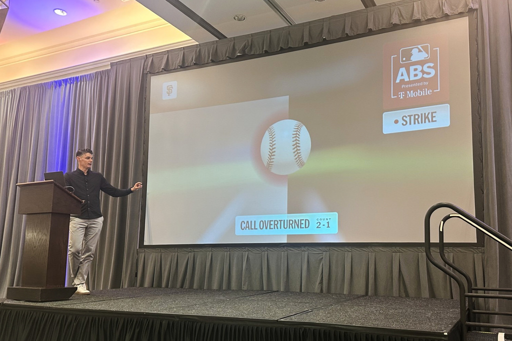 MLB Vice President of On-Field Strategy Joe Martinez gives a presentation about the new Automated Ball/Strike system that will be used in regular season games, Thursday, Feb. 12, 2026, in Scottsdale, Ariz. (AP Photo/David Brandt)