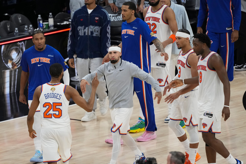 The New York Knicks celebrate after Game 1 of the NBA Finals basketball series against the San Antonio Spurs, Wednesday, June 3, 2026, in San Antonio. (AP Photo/Eric Gay)