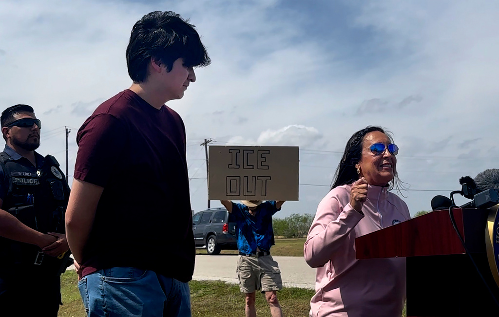 Republican congresswoman Monica de la Cruz of District 15, speaks to the media with Antonio Gamez Cu»llar, 18, after leaving the El Valle Detention Facility in Raymondville, Texas on Monday, March 9, 2026. (AP Photo/Valerie Gonzalez)