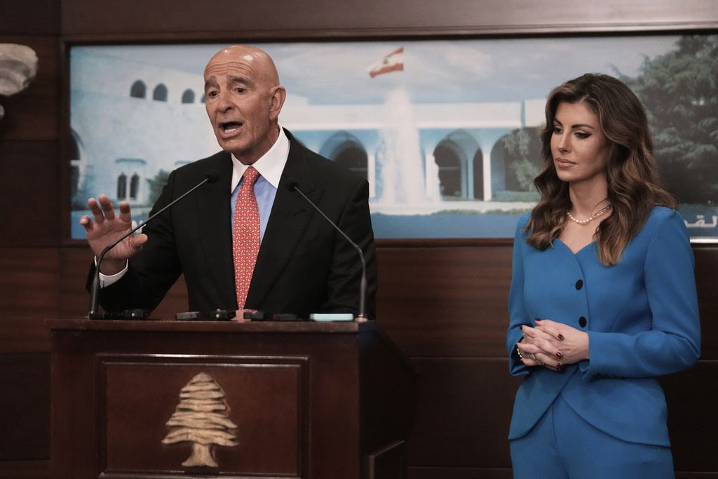 U.S. Ambassador to Turkey and Special Envoy to Syria Tom Barrack, left, speaks during a joint press conference with U.S. deputy special envoy for Middle East peace Morgan Ortagus, after they and other U.S. senators met with the Lebanese President Joseph Aoun, at the presidential palace in Baabda, east of Beirut, Lebanon, Tuesday, Aug. 26, 2025. (AP Photo/Hussein Malla)