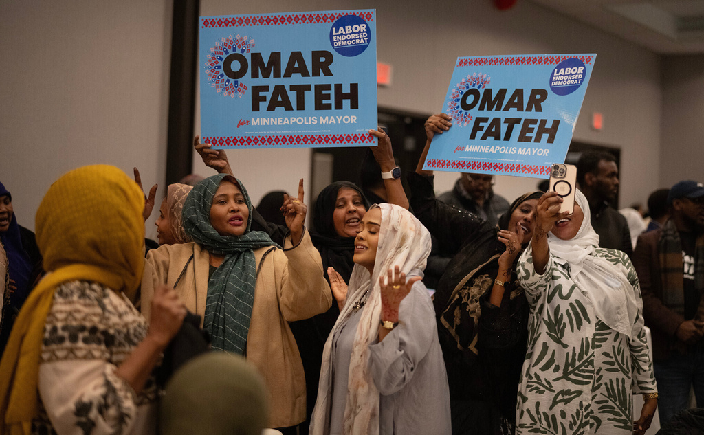Supporters of Minneapolis mayoral candidate Omar Fateh dance at his watch party, Tuesday, Nov. 4, 2025, in Minneapolis. (Jerry Holt/Star Tribune via AP)