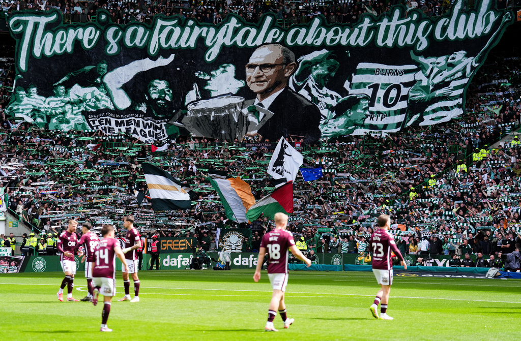 Celtic fans present a tifo featuring manager Martin O'Neill during the Premiership soccer match between Celtic and Heart of Midlothian, in Glasgow, Scotland, Saturday May 16, 2026. (Andrew Milligan//PA via AP)