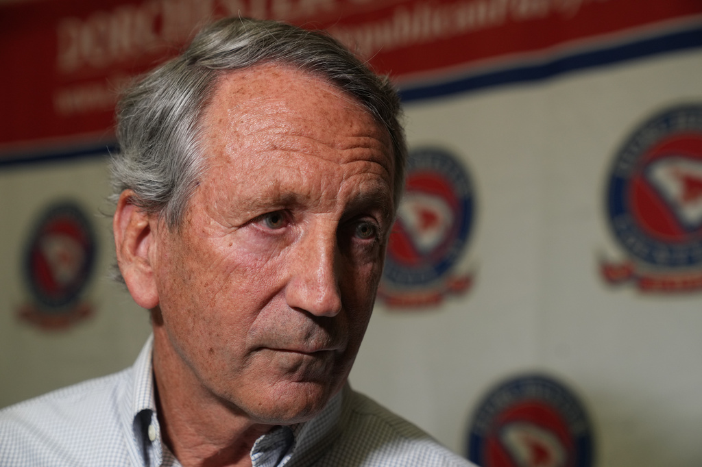 Mark Sanford, former congressman and South Carolina governor, takes questions from reporters as he campaigns for his former U.S. House seat at a Dorchester County GOP event Thursday, April 9, 2026, in Summerville, S.C. (AP Photo/Meg Kinnard)
