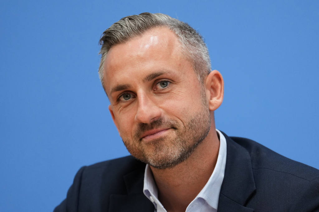 Top candidate for the Saxony-Anhalt state elections Ulrich Siegmund, center, attends a press conference in Berlin, Germany, Monday, Sept. 7, 2026. (AP Photo/Ebrahim Noroozi)