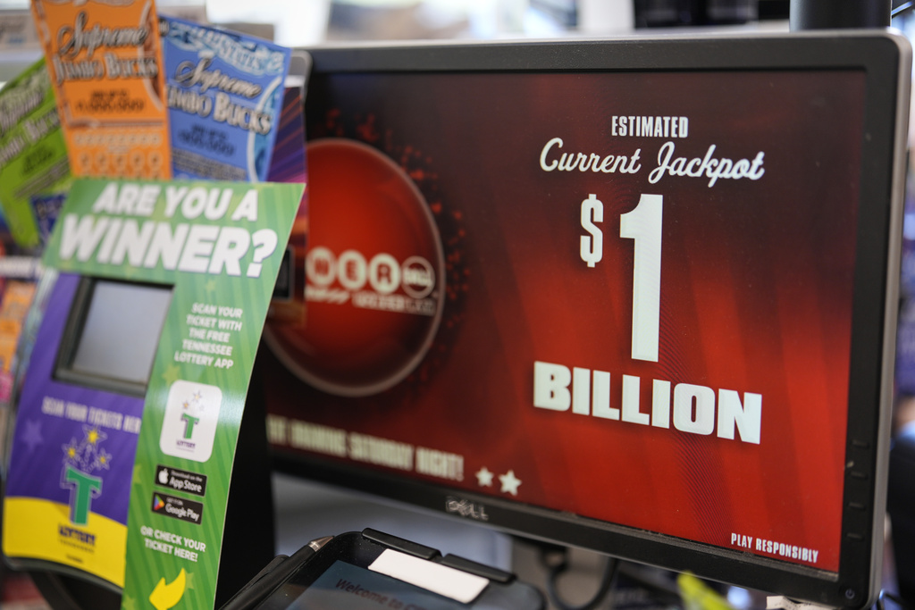 A lottery kiosk advertising Powerball's $1 Billion jackpot is seen Friday, Aug. 29, 2025, in Nashville, Tenn. (AP Photo/George Walker IV)