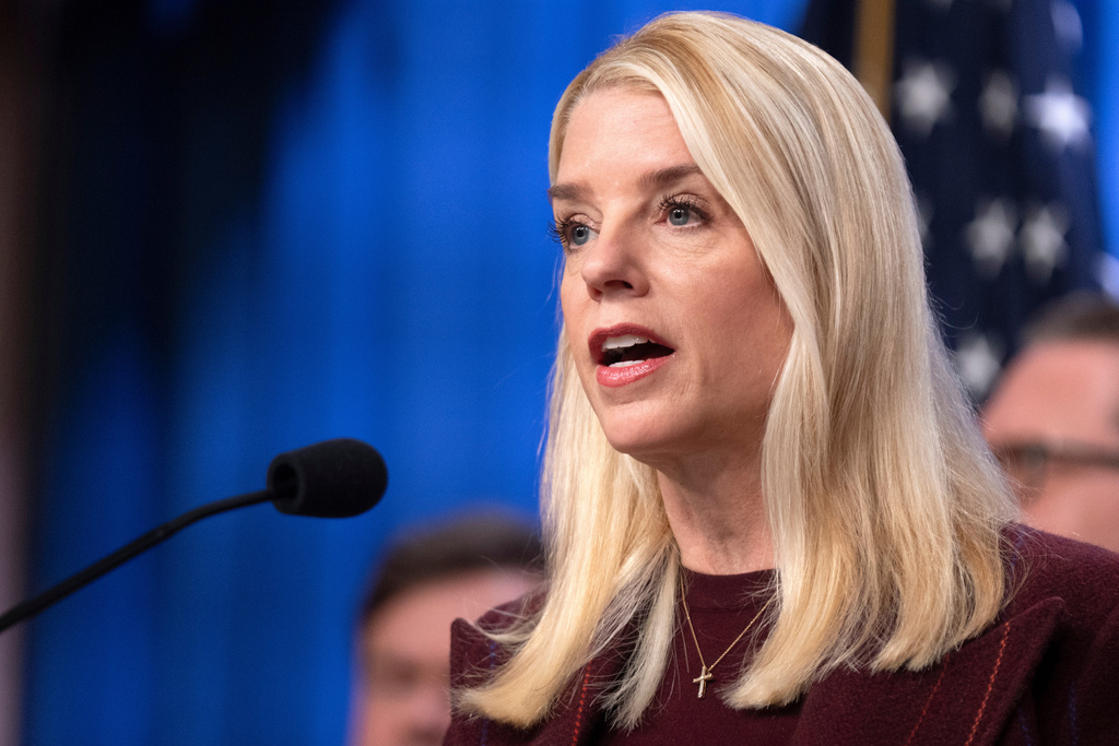 Attorney General Pam Bondi speaks with reporters during a news conference at the Department of Justice, Wednesday, Nov. 19, 2025, in Washington. (AP Photo/Mark Schiefelbein)