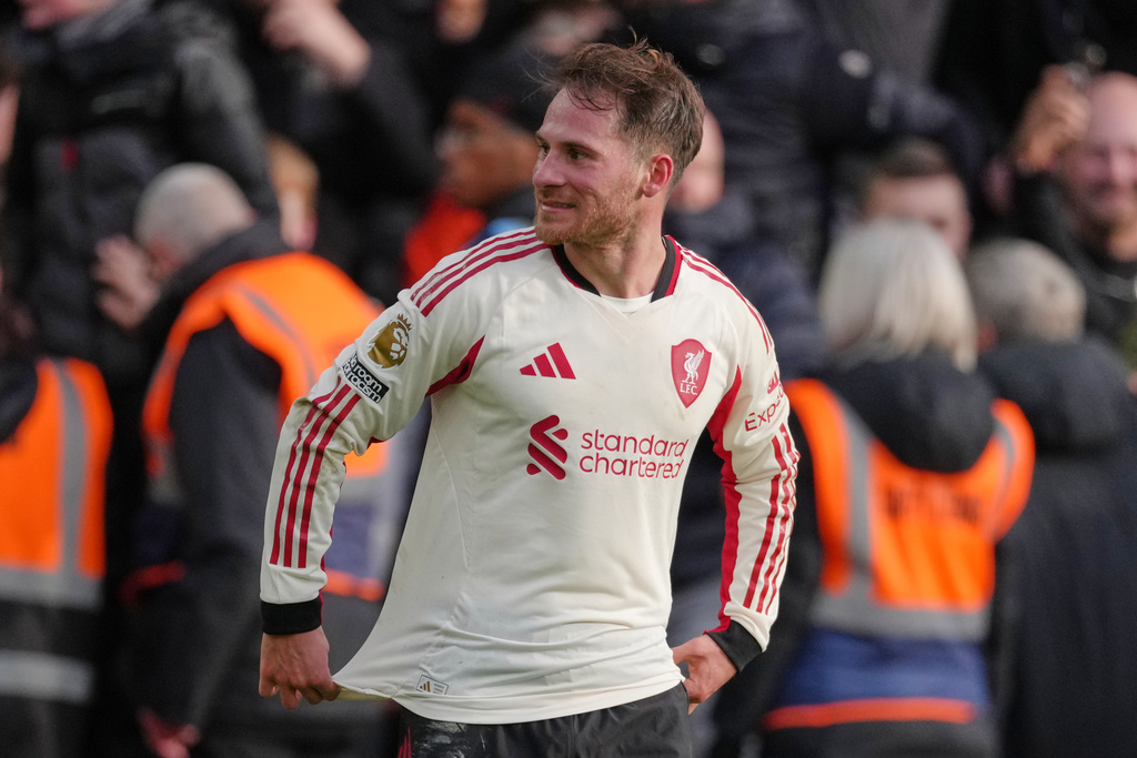Liverpool's Alexis Mac Allister celebrates scoring his side's first goal during the English Premier League soccer match between Nottingham Forest and Liverpool in Nottingham, Sunday, Feb. 22, 2026.(AP Photo/Dave Shopland)