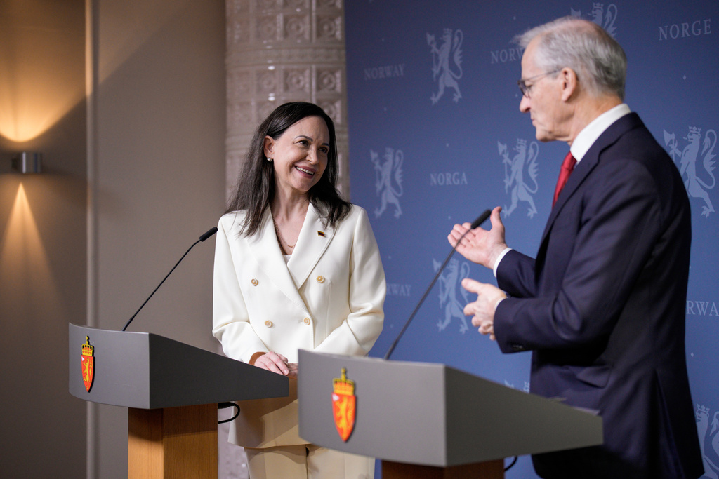 Nobel Peace Prize laureate María Corina Machado and Norway's Prime Minister Jonas Gahr Støre hold a joint press conference at the government's representative facilities in Oslo, Norway, Thursday, Dec. 11, 2025. (Stian Lysberg Solum/NTB Scanpix, Pool Photo via AP)