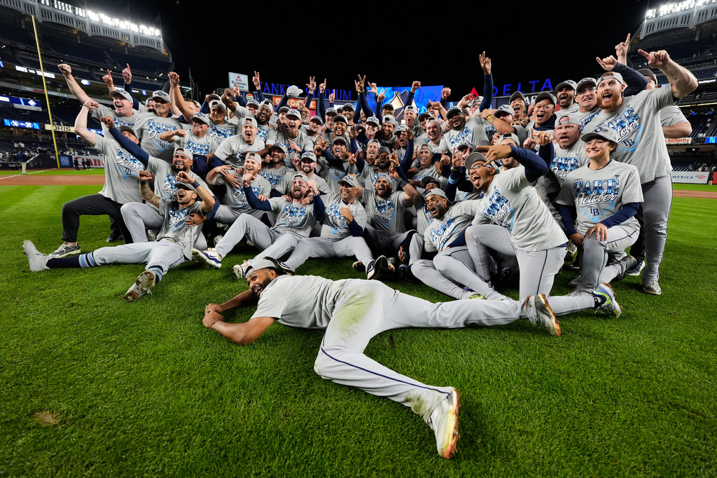 The Tampa Bay Rays celebrate the team's win in Game 3 of baseball's American League Division Series against the New York Yankees, Wednesday, Oct. 7, 2026, in New York. (AP Photo/Yuki Iwamura)