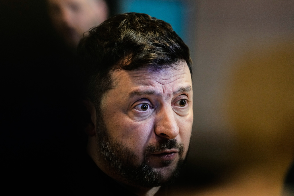 Ukraine's President Volodymyr Zelenskyy talks to the media at the Annual Meeting of the World Economic Forum in Davos, Switzerland, Thursday, Jan. 22, 2026. (AP Photo/Markus Schreiber)