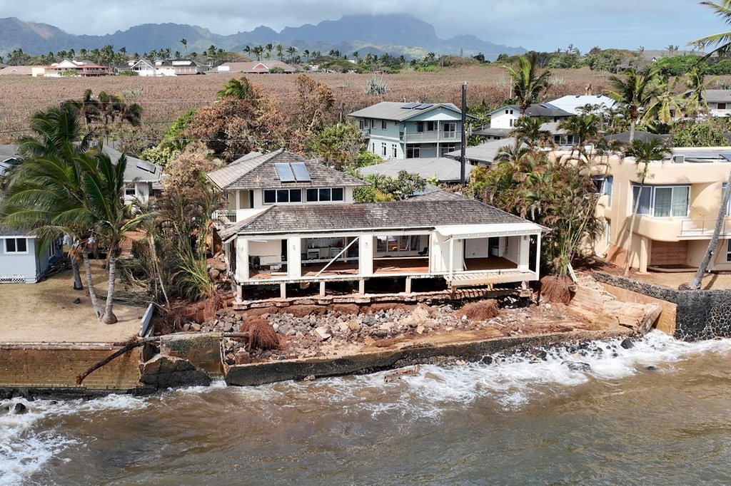 A home damaged by Hurricane Lowell is seen Thursday, Sept. 10, 2026, in Poipu, Hawaii. (Nathan Eagle/Honolulu Civil Beat via AP)