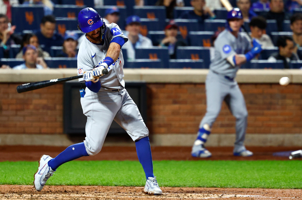 Chicago Cubs' Dansby Swanson hits a two-run home run against the New York Mets during the fourth inning of a baseball game, Tuesday, June 23, 2026, in New York. (AP Photo/Noah K. Murray)
