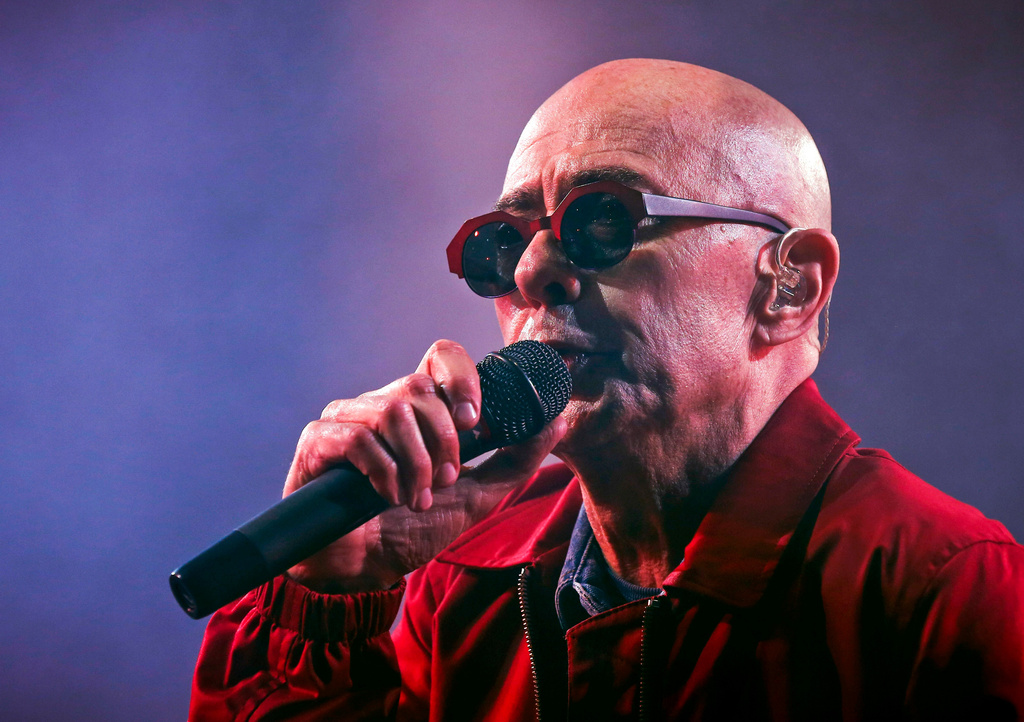 FILE - Argentine singer Indio Solari performs in Olavarria, Argentina, March 11, 2017. (AP Photo/Hernan Leonardi, File)