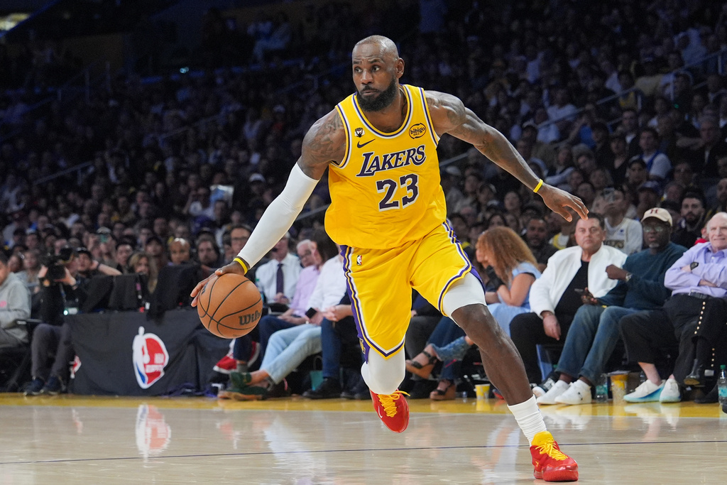 Los Angeles Lakers forward LeBron James drives to the basket during the second half of an NBA basketball game against the Golden State Warriors Saturday, Feb. 7, 2026, in Los Angeles. (AP Photo/Jae C. Hong)
