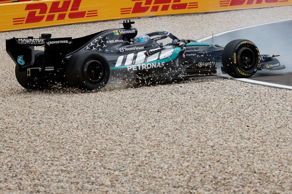 Mercedes driver George Russell of Britain spins off the track during the Formula One Grand Prix at the Spa-Francorchamps racetrack in Spa, Belgium, Sunday, July 19, 2026. (AP Photo/Geert Vanden Wijngaert)