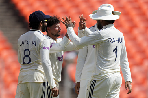 India's Kuldeep Yadav, second left, celebrates with teammates after the dismissal of West Indies' captain Roston Chase on the third day of the first Test cricket match between India and West Indies at Narendra Modi Stadium in Ahmedabad, India, Saturday, Oct. 4, 2025. (AP Photo/Ajit Solanki) India's Kuldeep Yadav, second left, celebrates with teammates after the dismissal of West Indies' captain Roston Chase on the third day of the first Test cricket match between India and West Indies at Narendra Modi Stadium in Ahmedabad, India, Saturday, Oct. 4, 2025. (AP Photo/Ajit Solanki)