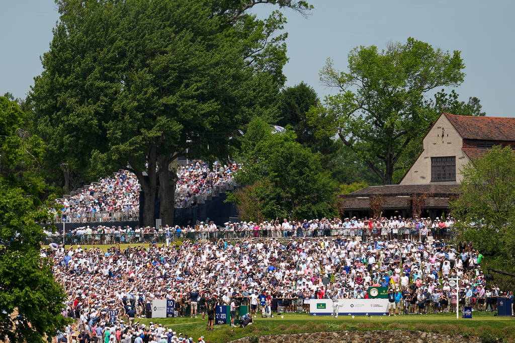 Scottie Scheffler hits from the first tee during the final round of the PGA Championship golf tournament at Aronimink Golf Club, Sunday, May 17, 2026, in Newtown Square, PA. (AP Photo/Carolyn Kaster)