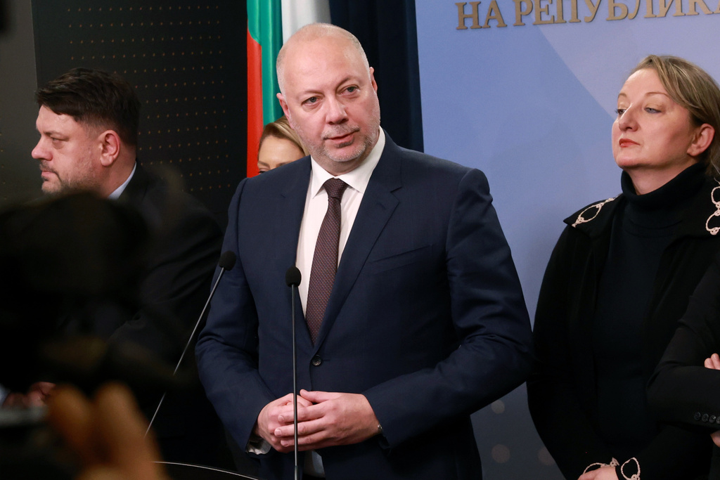 Bulgarian Prime Minister Rosen Zhelyazkov announces that Bulgaria's government resigns following mass protests, at the Bulgarian Parliament in Sofia, Bulgaria, Thursday, Dec. 11, 2025. (Bulgarian News Agency via AP)