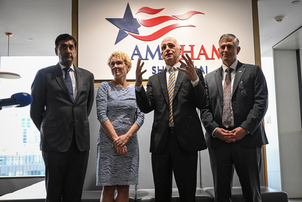 US Representative Adam Smith, second right, speaks as he stands next to Democratic member of House Armed Services Committee Ro Khanna, left, Democratic member of House Armed Services Committee Chrissy Houlahan, second left and Republican member of House Foreign Affairs Committee Michael Baumgartner, right during a press conference at the American Chamber of Commerce (AmCham) in Shanghai , China, Thursday, Sept.25, 2025. (Jade Gao/Pool Photo via AP)
