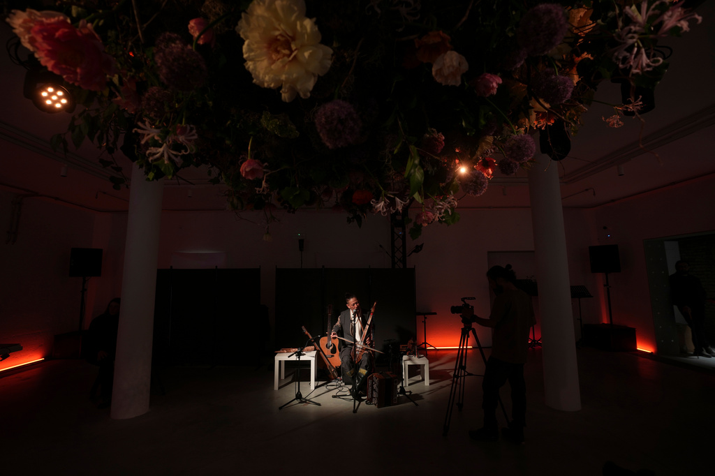 Musician Alexey Khovalyg performs inside the Russia pavilion at the Venice 2026 Biennale Art, Italy, Tuesday, May 5, 2026. (AP Photo/Luca Bruno)