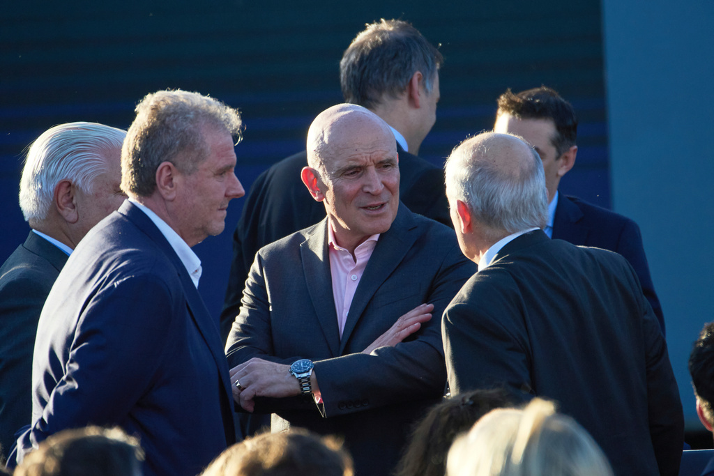 Deputy Jose Luis Espert, center, attends Argentina's President Javier Milei's presentation of a draft reform of the criminal code to be sent to the Congress at Ezeiza Prison Complex in Ezeiza, Argentina, Thursday, Oct. 2, 2025. (AP Photo/Rodrigo Abd)