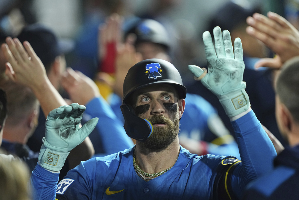 Philadelphia Phillies' Bryce Harper celebrates after his two-run home run off Kansas City Royals pitcher Michael Lorenzen during the third inning of a baseball game, Friday, Sept. 12, 2025, in Philadelphia. (AP Photo/Matt Rourke)