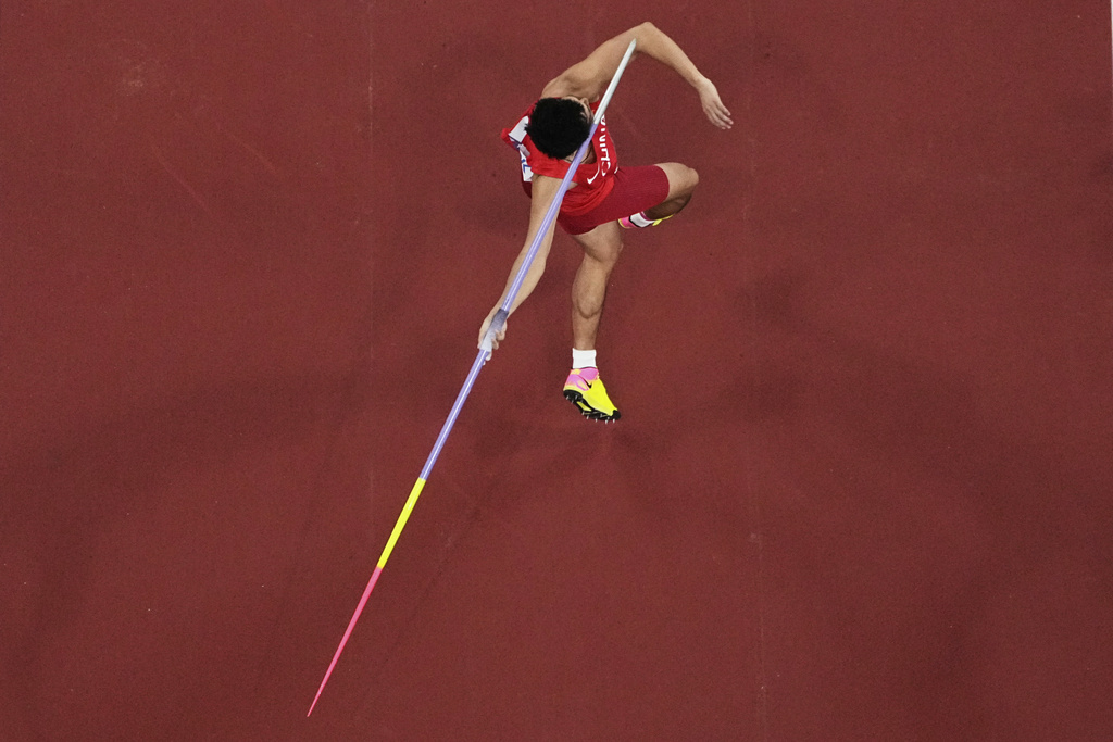 China's Hu Haoran makes an attempt during the men's javelin throw qualification at the World Athletics Championships in Tokyo, Wednesday, Sept. 17, 2025. (AP Photo/Bernat Armangue)