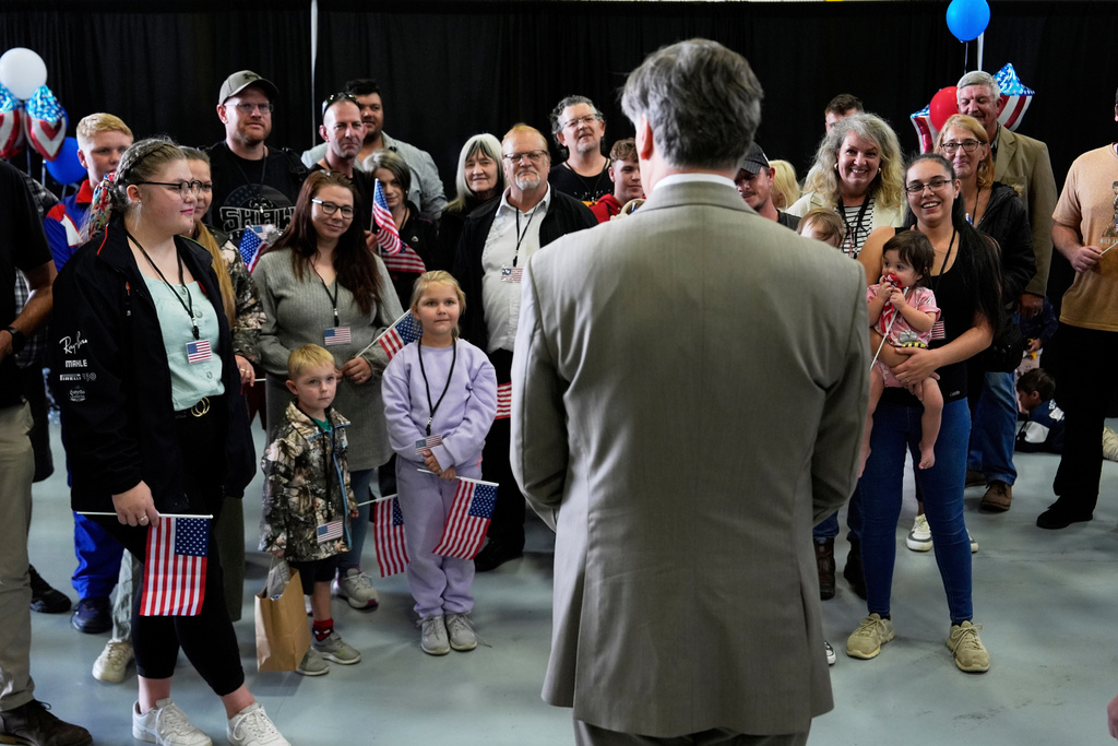 FILE - Deputy Secretary of State Christopher Landau greets Afrikaner refugees from South Africa, May 12, 2025, at Dulles International Airport in Dulles, Va. (AP Photo/Julia Demaree Nikhinson, File)