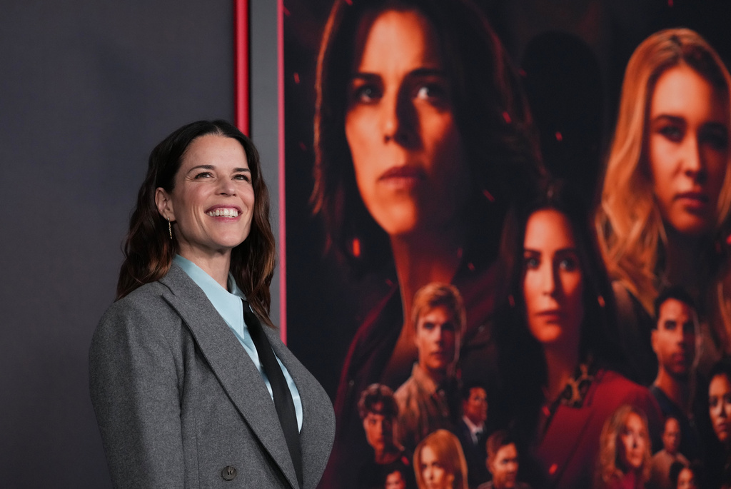 Neve Campbell, a cast member in "Scream 7," arrives at the premiere of the film on Wednesday, Feb. 25, 2026, at Paramount Studios in Los Angeles. (AP Photo/Chris Pizzello)