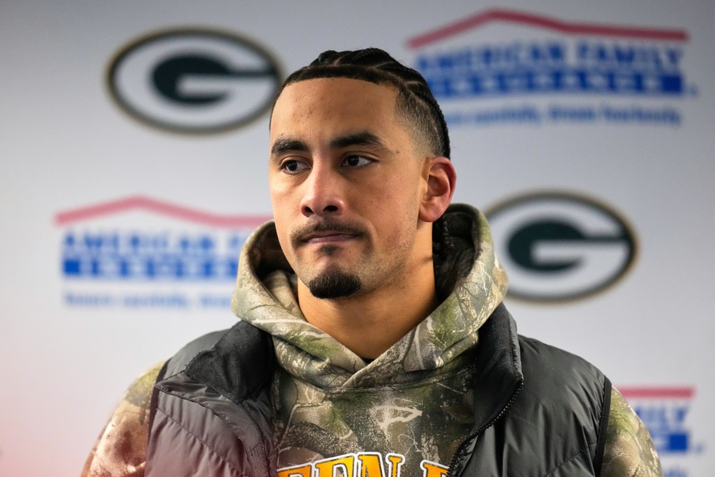 Green Bay Packers' Jordan Love talks after an NFL wild-card playoff football game against the Chicago Bears Saturday, Jan. 10, 2026, in Chicago. (AP Photo/Erin Hooley)