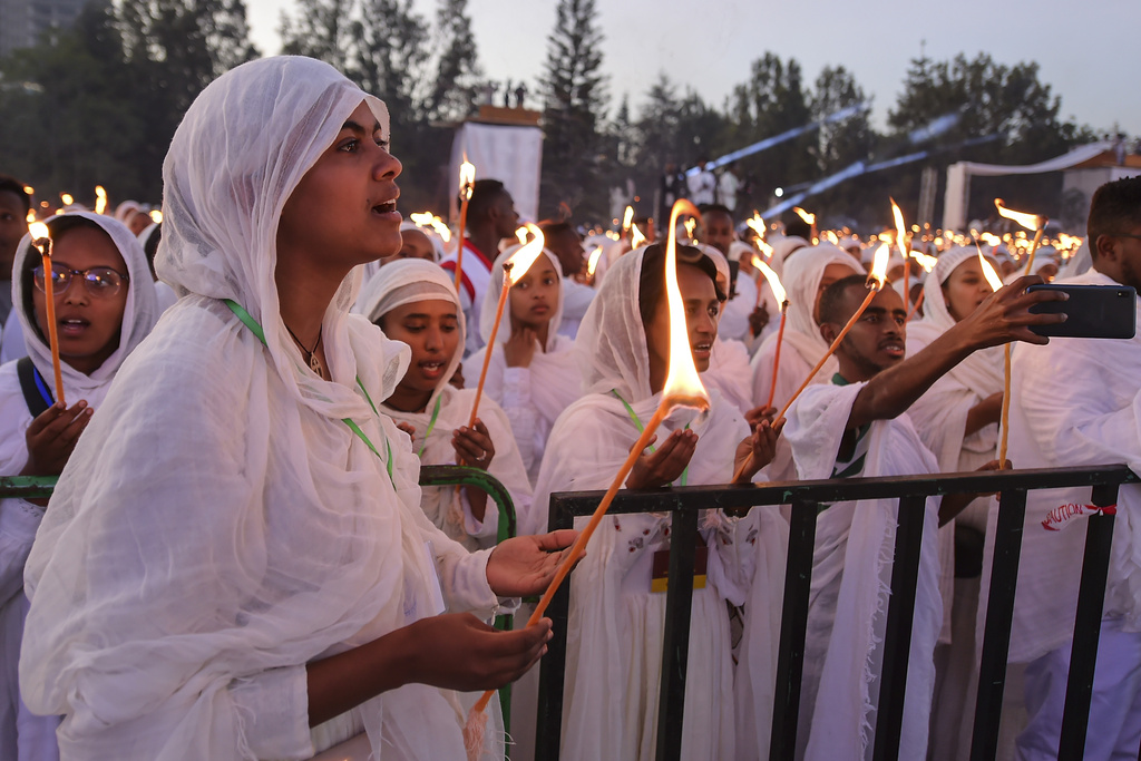 Ethiopian pilgrims pray during a Mass service for Ethiopian Christmas at the Bole Medhane Alem cathedral in Addis Ababa, Ethiopia, Monday, Jan. 6, 2025. (AP Photo)