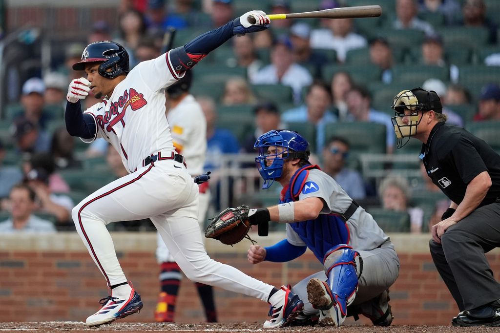 Atlanta Braves' Josè Azocar hits a single in the third inning of a baseball game against the Chicago Cubs, Wednesday, May 13, 2026, in Atlanta. (AP Photo/Mike Stewart)